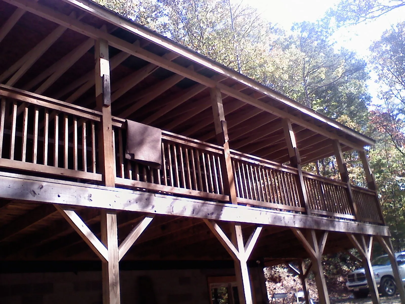 Timber framing under a new elevated porch and deck — Roof Leak Repair in Leawood by Roofing Brothers